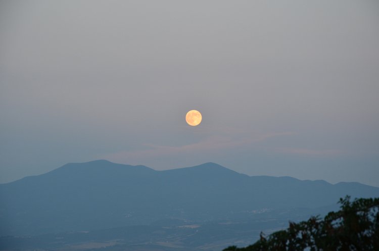 full moon over tuscany