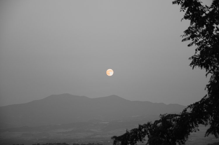 full moon over tuscany